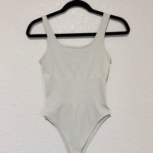OQQ white ribbed bodysuit Size S PTP 13”